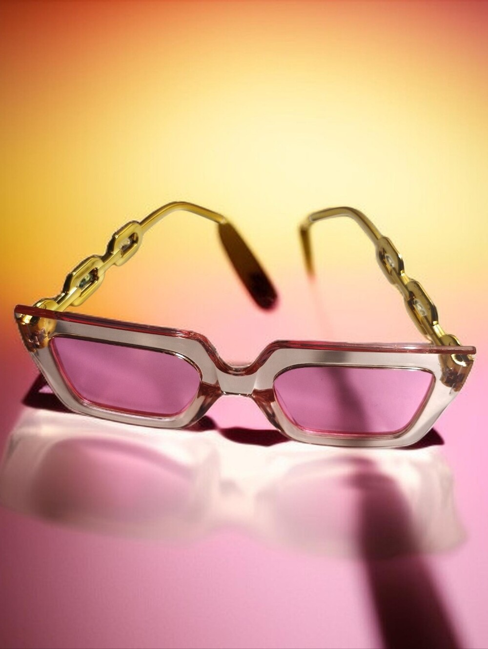 Clear Frame Sunglasses with Pink Lenses and Gold-Link Temples